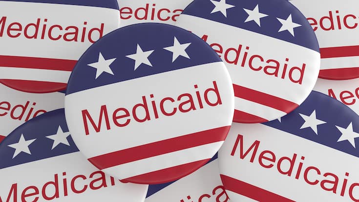 USA Politics News Badges: Pile of Medicaid Buttons With US Flag, 3d illustration