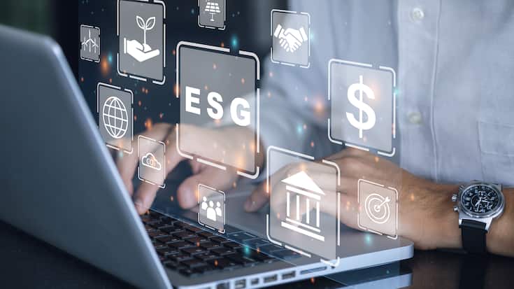 Businessman using a computer for analysis ESG environmental soci