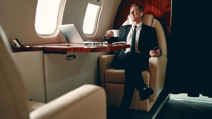 Businessman in private jet