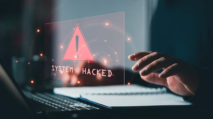 System hacked alert after cyber attack on computer network. comp