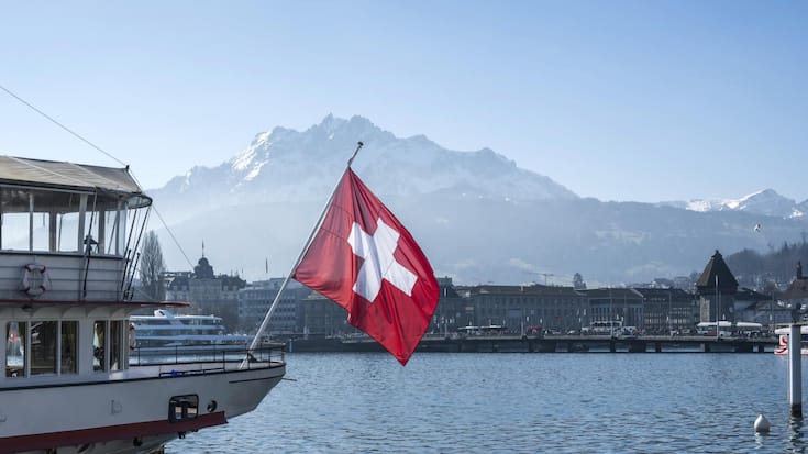 Ship Swiss flag and Pilatus, Lucerne, Switzerland, Europe