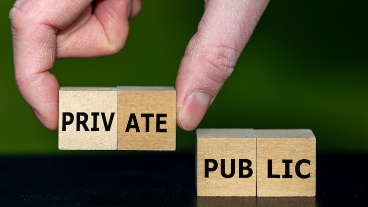 Hand selects cubes with the word private instead of cubes with the word public.