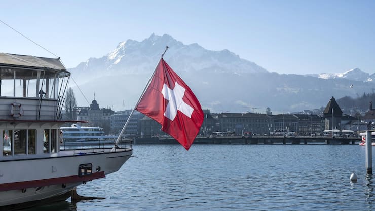 Ship Swiss flag and Pilatus, Lucerne, Switzerland, Europe