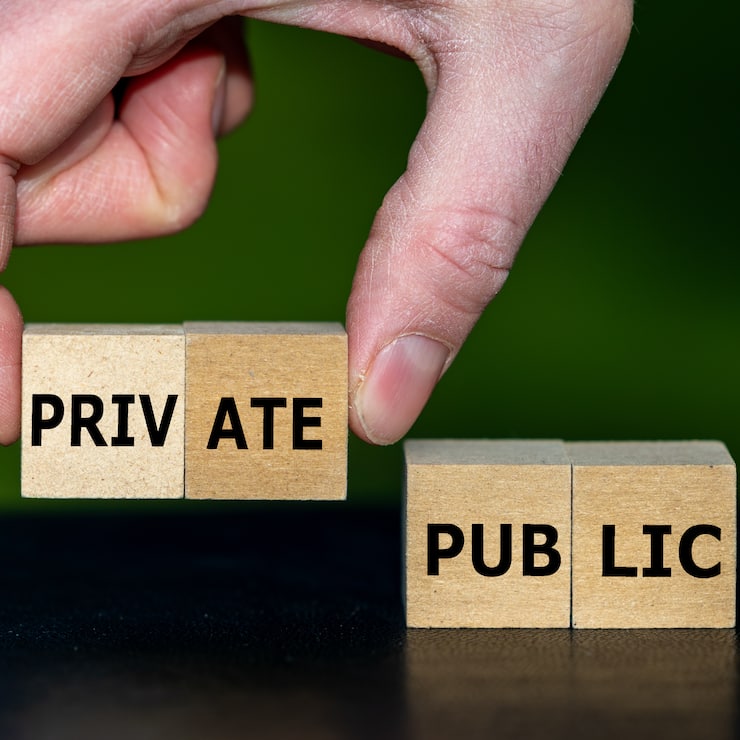 Hand selects cubes with the word private instead of cubes with the word public.